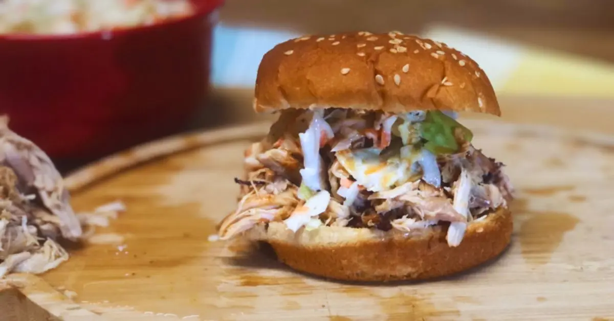 Tender slow cooker Carolina style pulled chicken sandwich