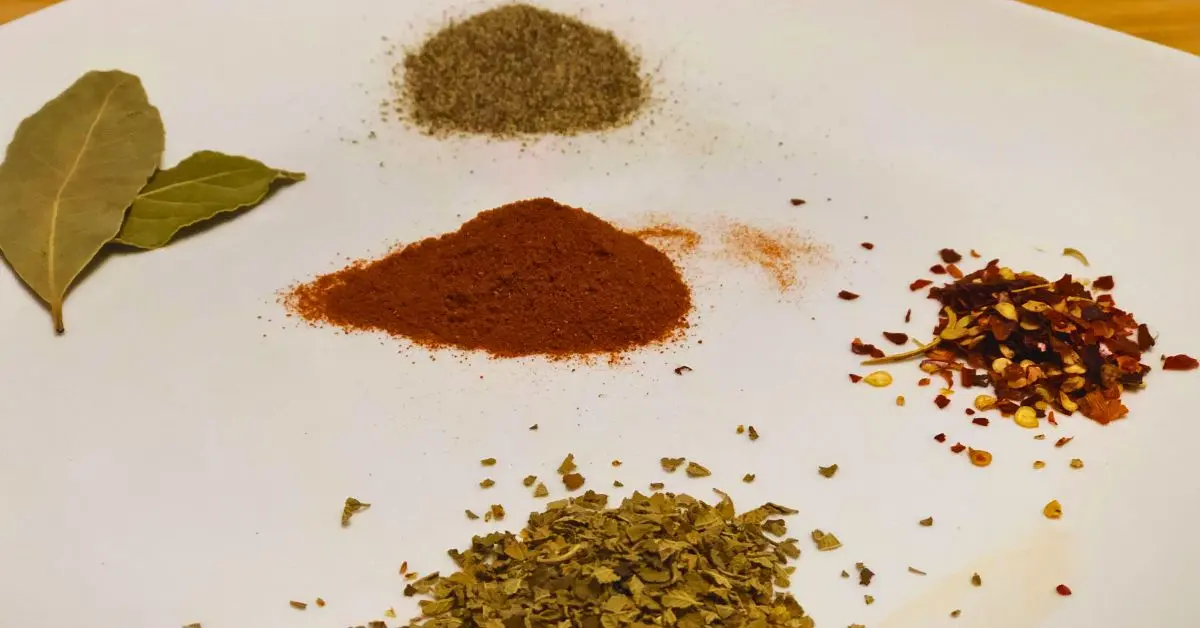 spices like italian seasoning , red pepper flakes and smoked papricka for an italian bean soup