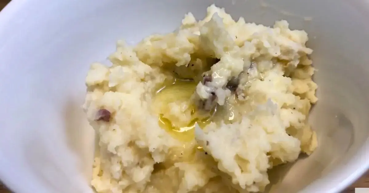 Rustic red skinned mashed potatoes with creamy texture and potato skin