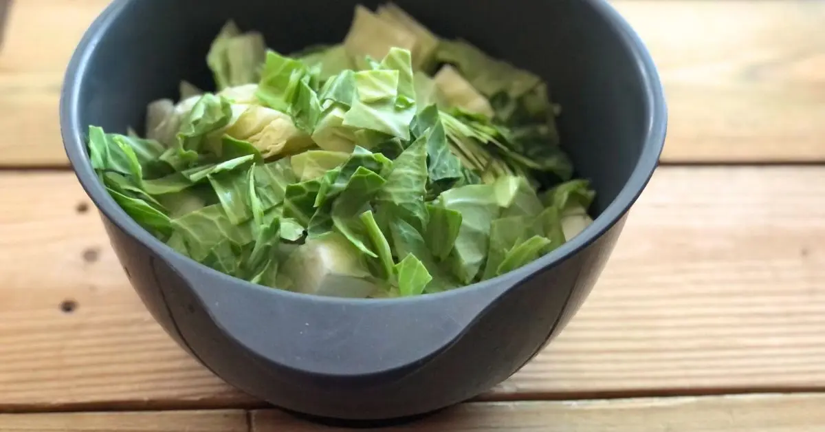 Freshly diced cabbage in a gray bowl, ready for making Shoney’s copycat cabbage soup.