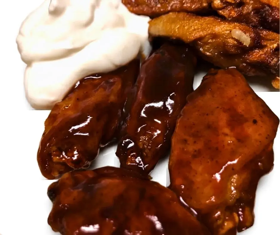 BBQ chicken wings served with garlic sour cream dip
