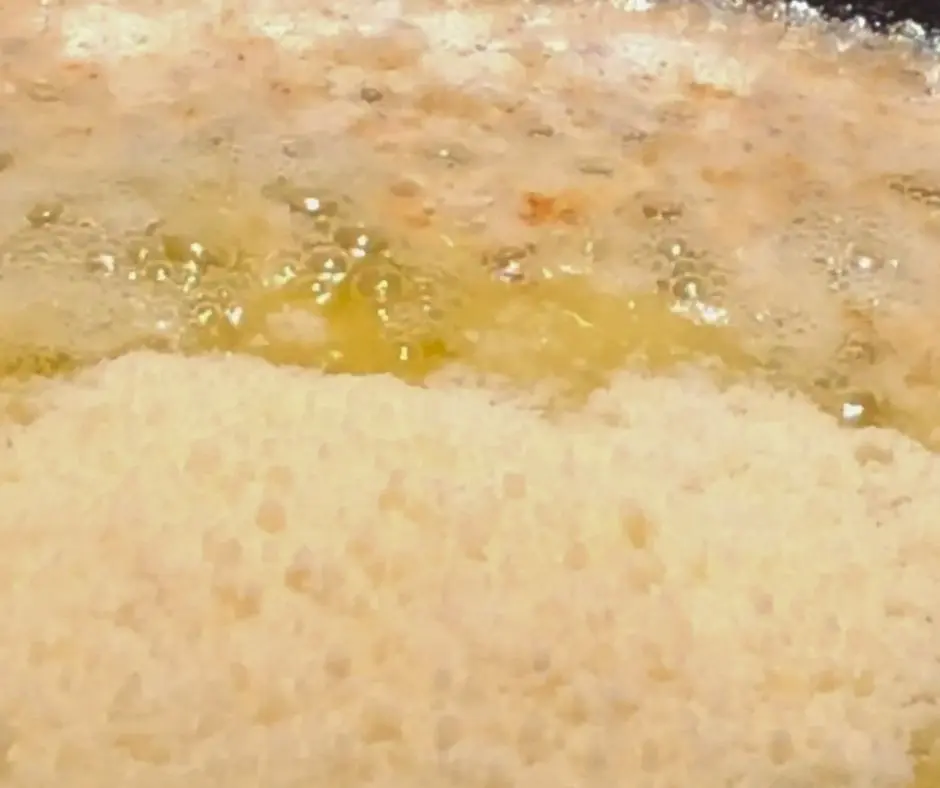 Garlic Parmesan butter sauce with Parmesan cheese added to melted butter